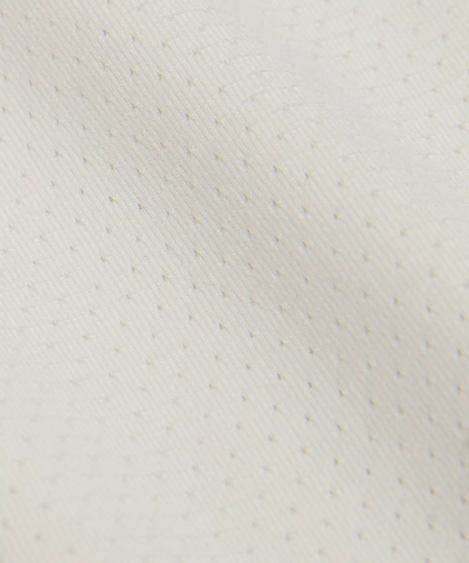 Close-up of cream performance fabric texture